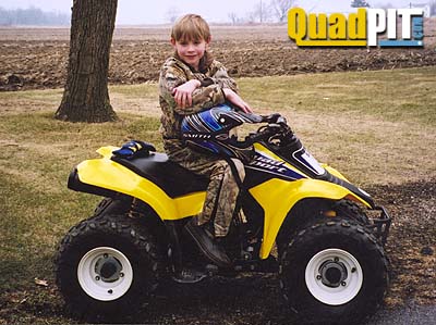 Jacob wishing he could keep riding instead of getting his picture taken